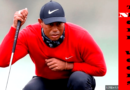 Tiger Woods preparando a tacada no golf